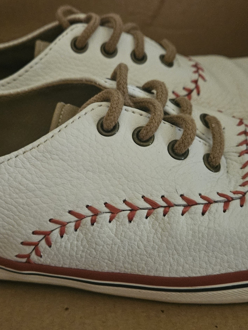 Keds White Sneakers with Red Stitching and Tan Laces